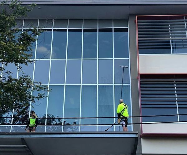power washing experts pressure cleaning Torquay Commercial building walls and glass windows